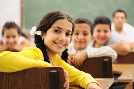 Students reading in a classroom